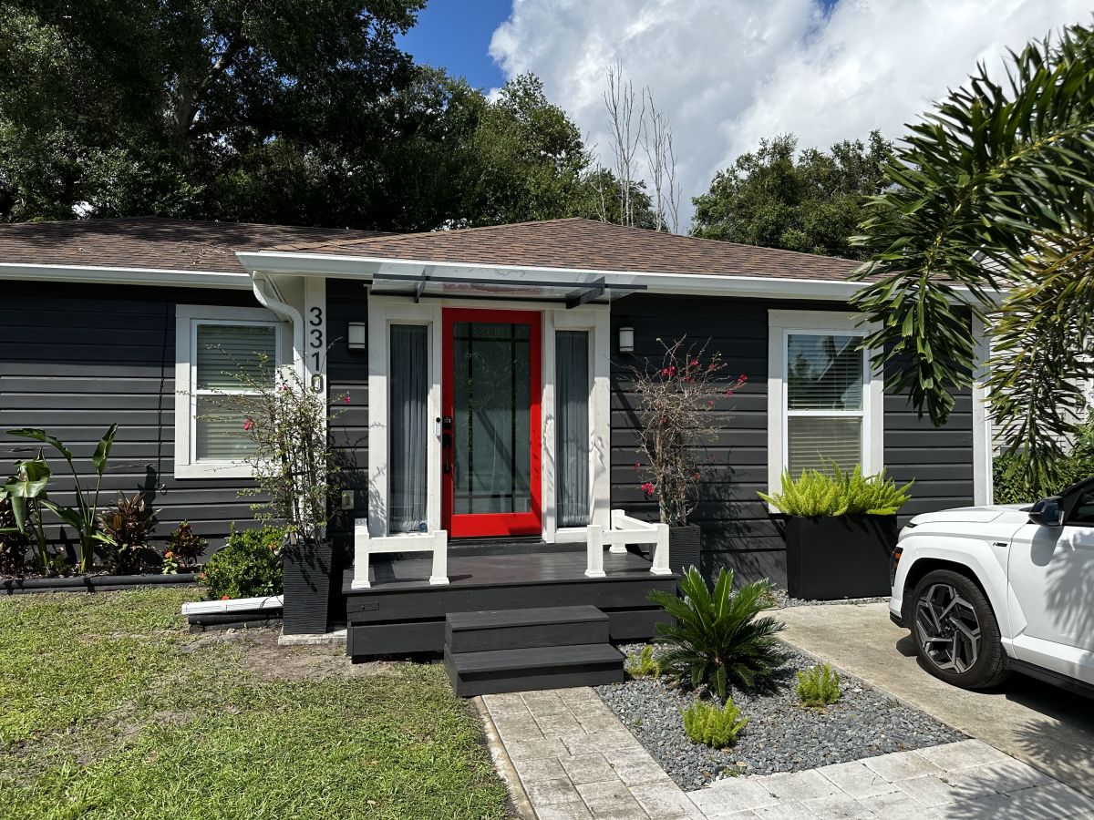 Completed home exterior with custom front entry, Tampa FL